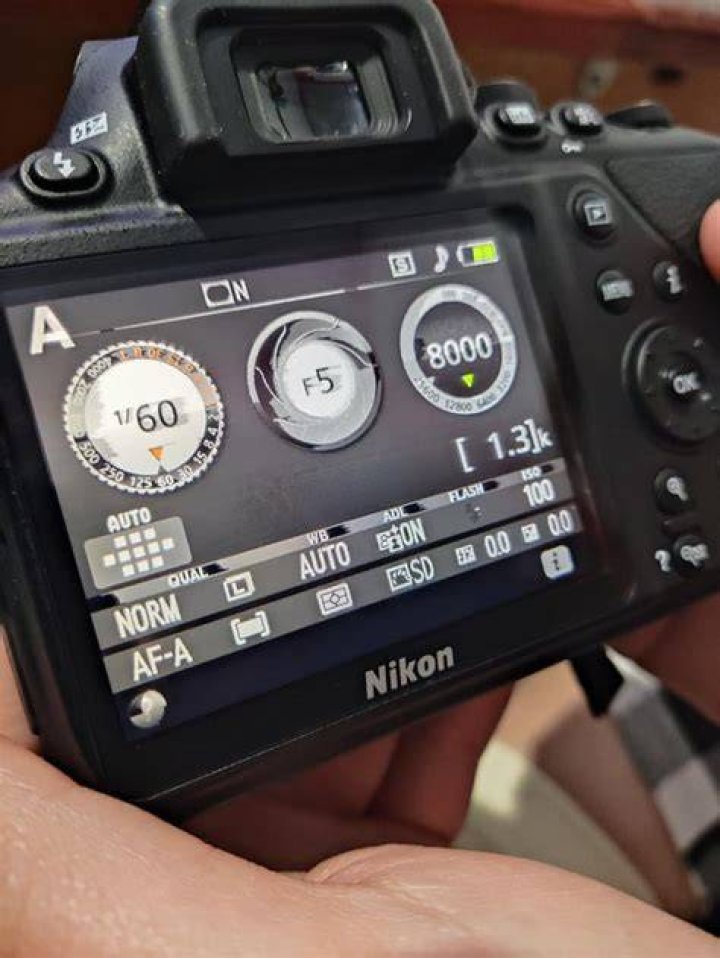 How do I take sharper pictures with my Nikon?