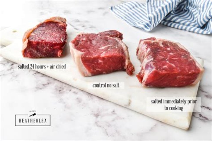 Should you put salt and pepper on steak before cooking?
